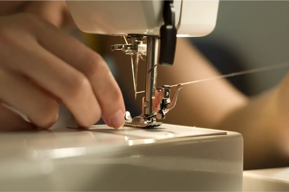 Threading the needle in a sewing machine