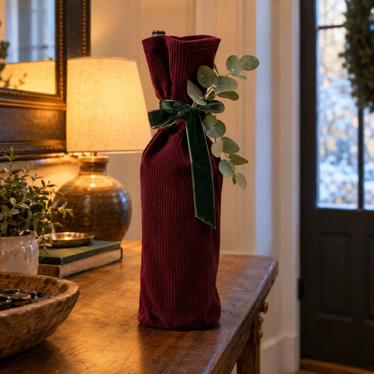 Corduroy wine bottle gift bag tied with velvet ribbon