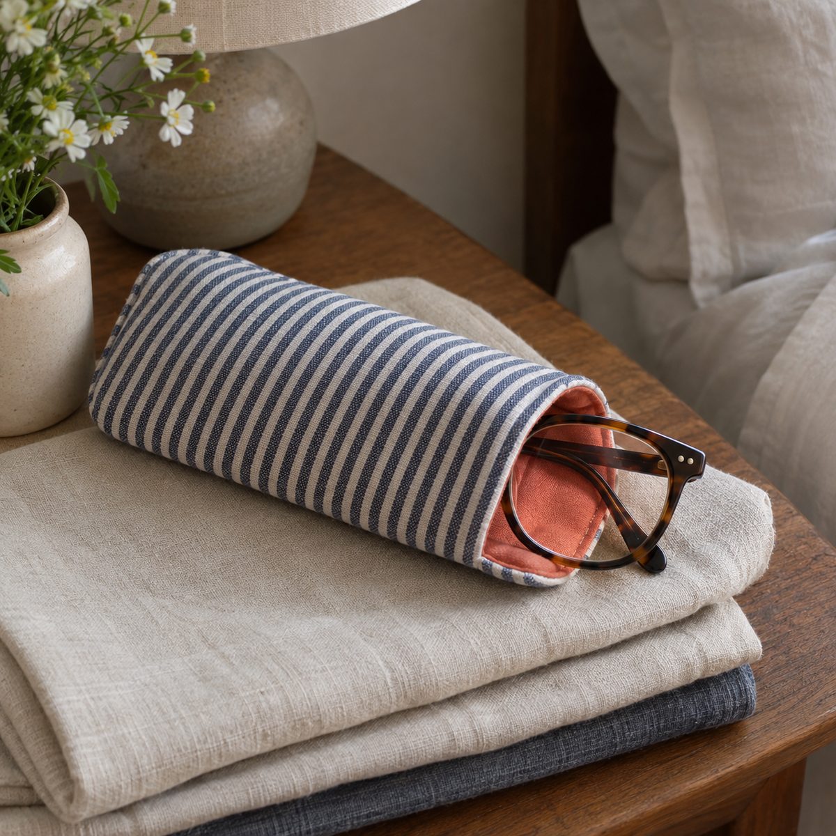 Navy ticking stripe padded eyeglass case with reading glasses